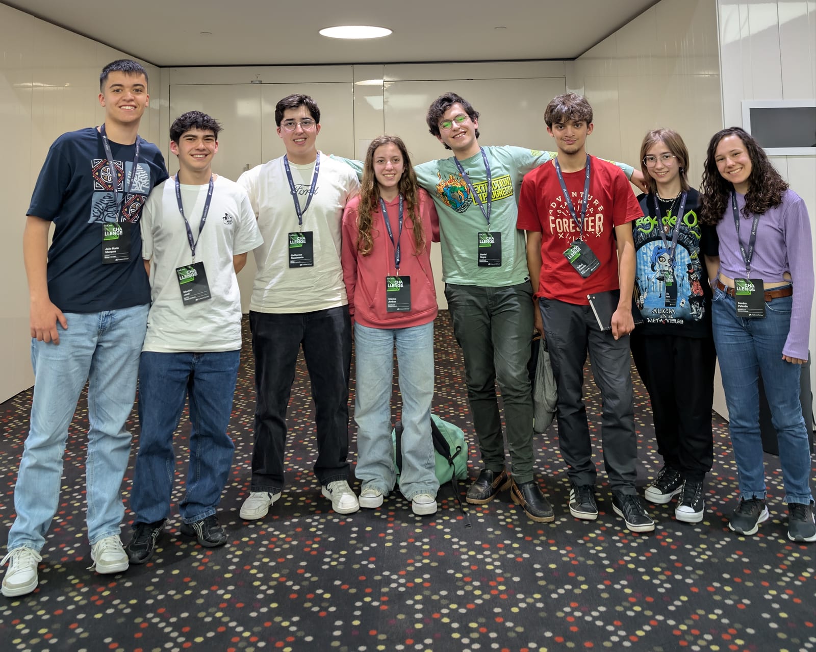 The SoundChestAI team poses indoors with another team at The Challenge 2025.